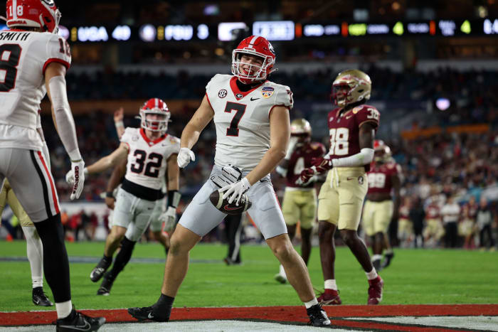 Dec 30, 2023; Miami Gardens, FL, USA; Georgia Bulldogs tight end Lawson Luckie (7) reacts after scoring a touchdown against the Florida State Seminoles during the second half in the 2023 Orange Bowl at Hard Rock Stadium.